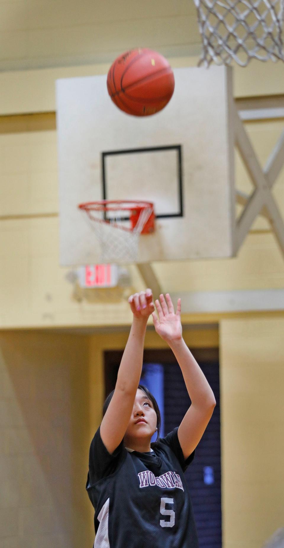 Nicole Leung practices with her Woodward School team at the Salvation Army gym in Quincy on Monday, Jan. 8, 2024.