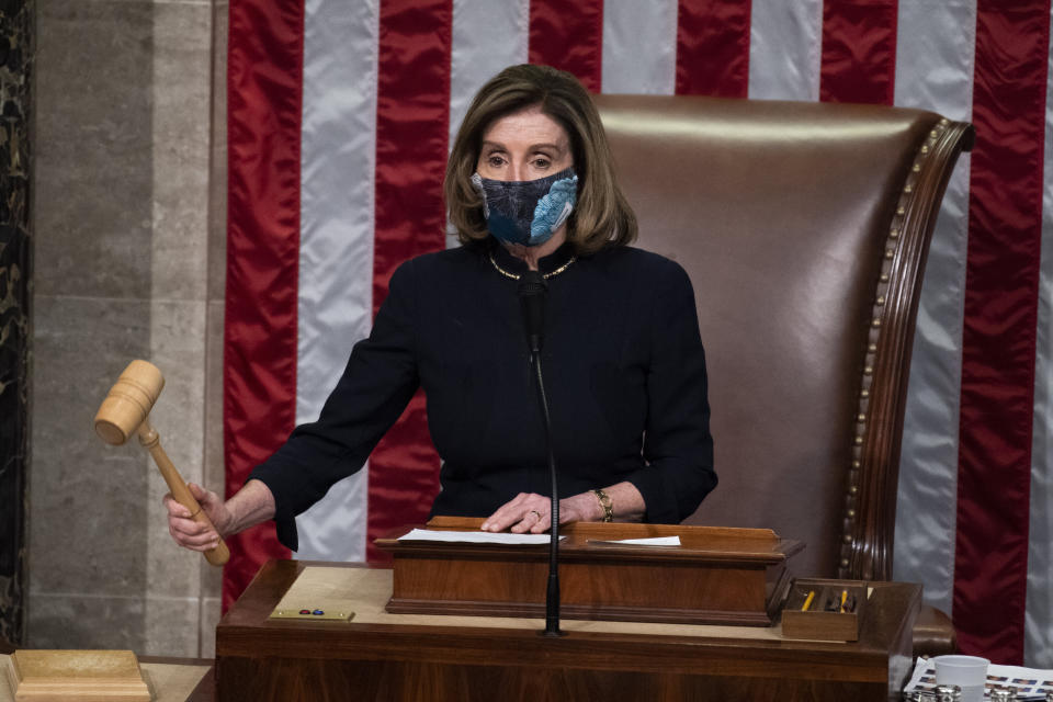 Speaker Nancy Pelosi (D-Calif.), gavels into recess after the House voted to impeach President Donald Trump on Wednesday, Jan. 13. (Photo: Tom Williams via Getty Images)
