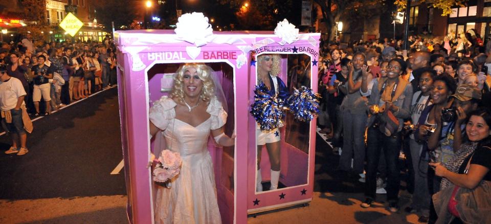 ‘Bridal Barbie’ and ‘Cheerleader Barbie’ march in a parade before a drag event in Washington, D.C., in 2010. <a href="https://www.gettyimages.com/detail/news-photo/bridal-and-cheerleader-barbie-made-their-way-along-the-news-photo/106154978?adppopup=true" rel="nofollow noopener" target="_blank" data-ylk="slk:Mark Gail/The Washington Post via Getty Images;elm:context_link;itc:0;sec:content-canvas" class="link ">Mark Gail/The Washington Post via Getty Images</a>