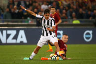 Soccer Football - Serie A - AS Roma vs Juventus - Stadio Olimpico, Rome, Italy - May 13, 2018 Juventus' Paulo Dybala in action with Roma's Radja Nainggolan REUTERS/Alessandro Bianchi