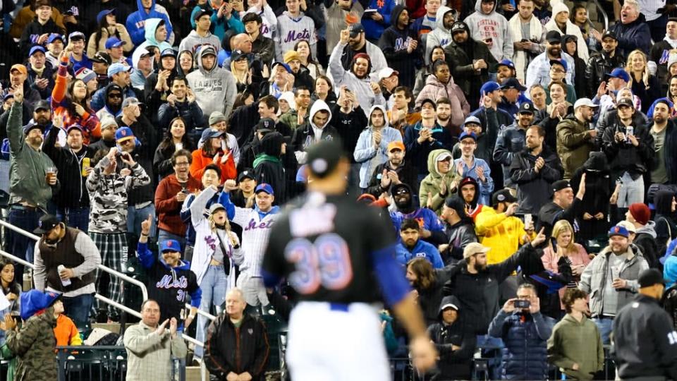 Apr 29, 2022; New York City, New York, USA; New York Mets fans cheer on New York Mets relief pitcher Edwin Diaz (39) in anticipation of a combined no-hitter against the Philadelphia Phillies during the ninth inning at Citi Field.