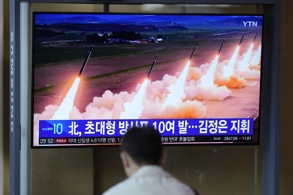 A TV screen shows a report of North Korea's multiple rocket launchers during a news program at the Seoul Railway Station in Seoul, South Korea, Friday, May 31, 2024. North Korean leader Kim Jong Un supervised firing drills involving nuclear-capable "super-large" multiple rocket launchers to show the country's ability to carry out preemptive attacks on rival South Korea, state media reported Friday. The letters read "North, super-large multiple rocket and Kim Jong Un supervised." (AP Photo/Lee Jin-man)