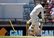 Cricket - Australia v South Africa - First Test cricket match - WACA Ground, Perth, Australia - 4/11/16 Australia's Usman Khawaja is bowled by South Africa's Kagiso Rabada at the WACA Ground in Perth. REUTERS/David Gray