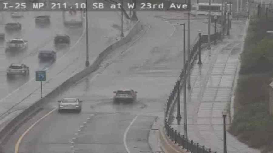 FOX31 gathered some photos from a Colorado Department of Transportation camera near an on-ramp to Interstate 25 near 23rd Avenue where many vehicles could be seen wading through water flooding the entrance to the freeway. (Colorado Department of Transportation)