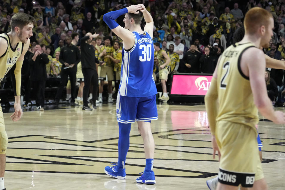 Duke's Kyle Filipowski (30) walks away after losing the ball during the second half of an NCAA college basketball game against Wake Forest in Winston-Salem, N.C., Saturday, Feb. 24, 2024. (AP Photo/Chuck Burton)