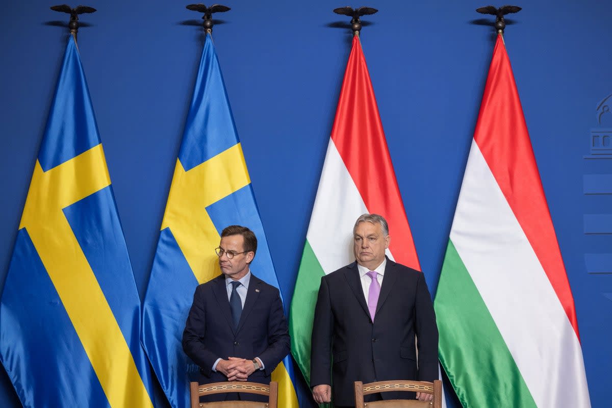 BUDAPEST, HUNGARY - FEBRUARY 23: Hungary's Prime Minister Viktor Orban (R) and Swedish Prime Minister Ulf Kristersson (L) hold a press conference following their meeting in February 23, 2024 in Budapest, Hungary. The meeting comes as Hungary's ruling party has indicated it's prepared to ratify Sweden's accession to NATO. After Turkey dropped its objection, Hungary remained the only NATO member to oppose Sweden's bid, which was launched in the wake of Russia's large-scale invasion of Ukraine. (Photo by Janos Kummer/Getty Images) (Getty Images)