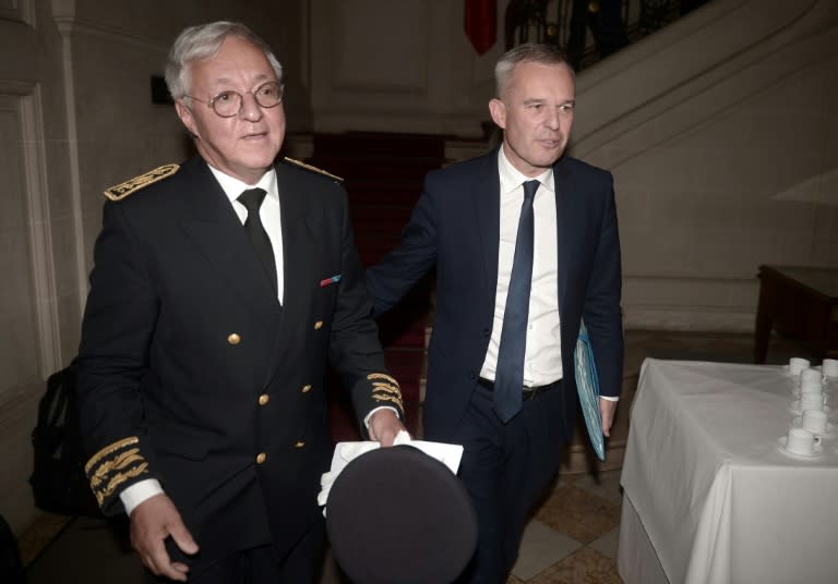 French Environment Minister Francois de Rugy, right, with Gilbert Payet, the government's top official for the Pyrenees-Atlantiques region of southwest France, ahead of a meeting Thursday in Pau with farmers opposed to bear re-introductions