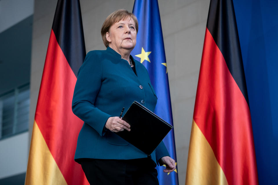 German Chancellor Angela Merkel arrives for a media statement on the spread of the new coronavirus disease (COVID-19) at the Chancellery in Berlin, Germany, March 22, 2020.   Michel Kappeler/Pool via REUTERS