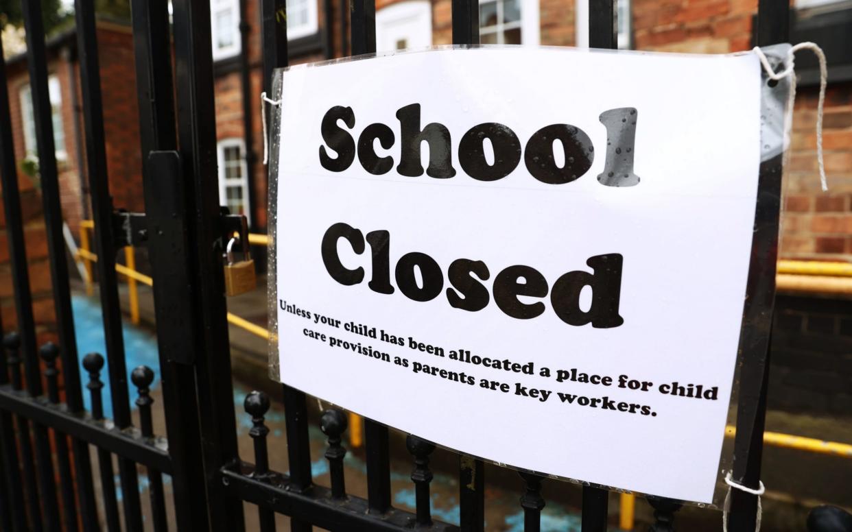 A sign outside a closed West Bridgford Infants School in Nottingham back in July - Tim Goode/PA