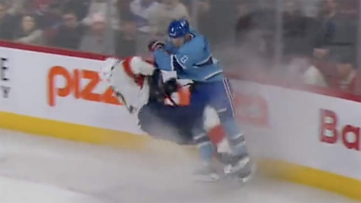Eric Staal, left, had to leave the game after this hit from Mike Matheson.