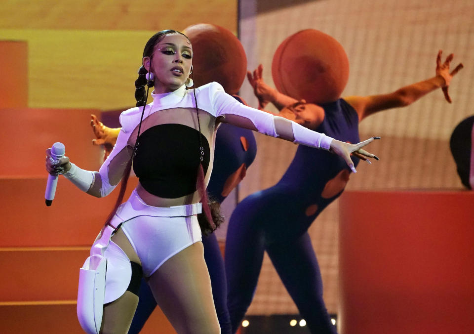 Doja Cat performs at the Billboard Music Awards, Friday, May 21, 2021, at the Microsoft Theater in Los Angeles. The awards show airs on May 23 with both live and prerecorded segments. (AP Photo/Chris Pizzello)