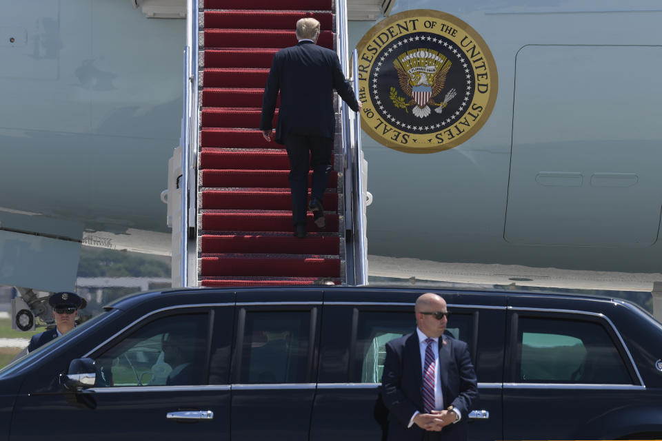 President Donald Trump boards Air Force One for a trip to Wisconsin, Thursday, June 25, 2020, in Andrews Air Force Base, Md. (AP Photo/Susan Walsh)