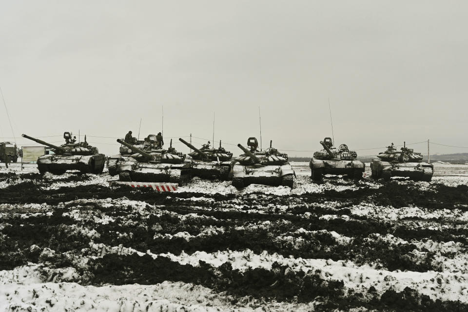 FILE - Russian tanks T-72B3 take part in drills at the Kadamovskiy firing range in the Rostov region in southern Russia, Jan. 12, 2022. Amid a buildup of Russian troops near Ukraine, Moscow has denied planning an attack on Ukraine but urged the U.S. and its allies to provide a binding pledge that NATO won't expand to Ukraine and won't deploy military assets there _ a demand rejected by the West. (AP Photo, File)