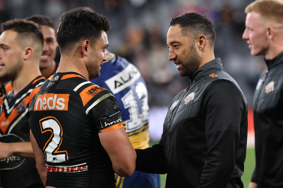 SYDNEY, AUSTRALIA - SEPTEMBER 26:  Benji Marshall of the Tigers talks with David Nofoaluma of the Tigers after playing his last game for the Tigers following the round 20 NRL match between the Wests Tigers and the Parramatta Eels at Bankwest Stadium on September 26, 2020 in Sydney, Australia. (Photo by Cameron Spencer/Getty Images)