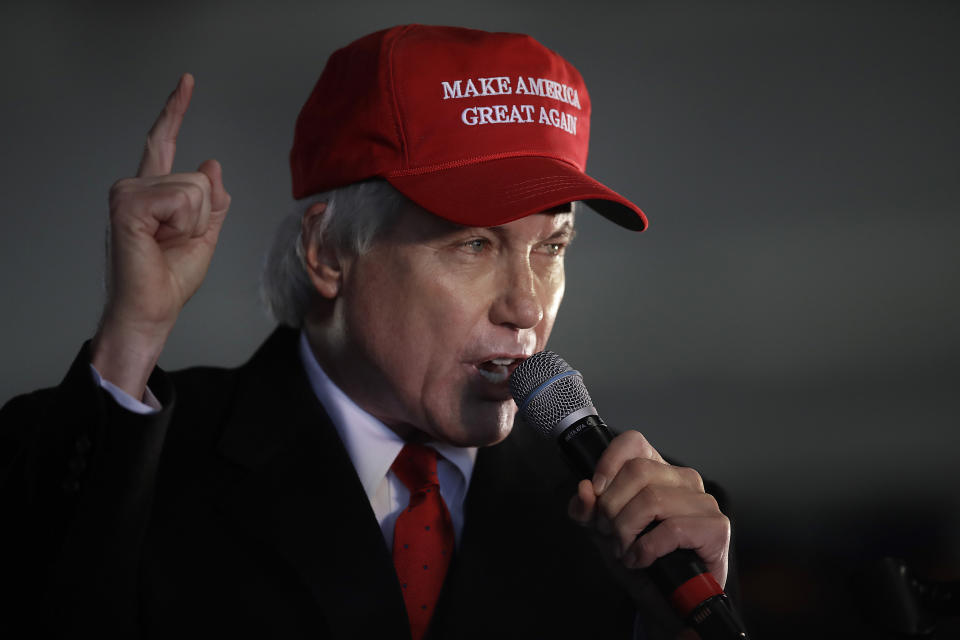 FILE - In this Dec. 2, 2020 file photo, Attorney Lin Wood, member of President Donald Trump's legal team, gestures while speaking during a rally in Alpharetta, Ga. In South Carolina, where Donald Trump's 2016 primary victory marked a turning point in solidifying his nomination, and where support for him remained high throughout his term in office, the contest to lead the state's Republican Party is turning into a debate over whose support for the former president is highest.(AP Photo/Ben Margot, File)