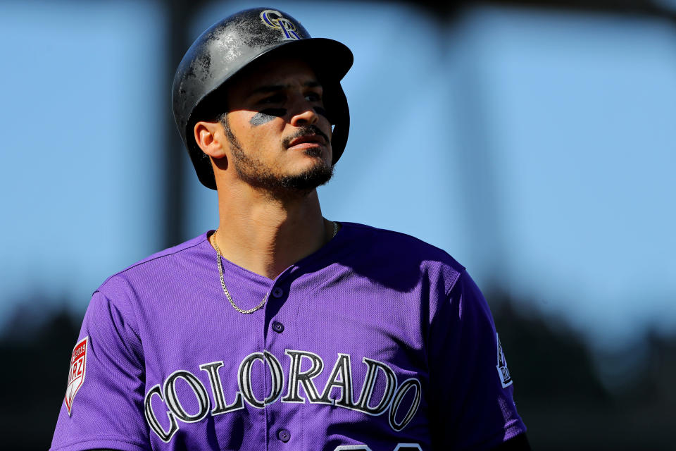 SCOTTSDALE, AZ - FEBRUARY 27: Nolan Arenado #28 of the Colorado Rockies walks back to the dugout during a Spring Training game against the Los Angeles Angels on Wednesday, February 27, 2019 at Salt River Fields at Talking Stick in Scottsdale, Arizona.  (Photo by Alex Trautwig/MLB Photos via Getty Images) 