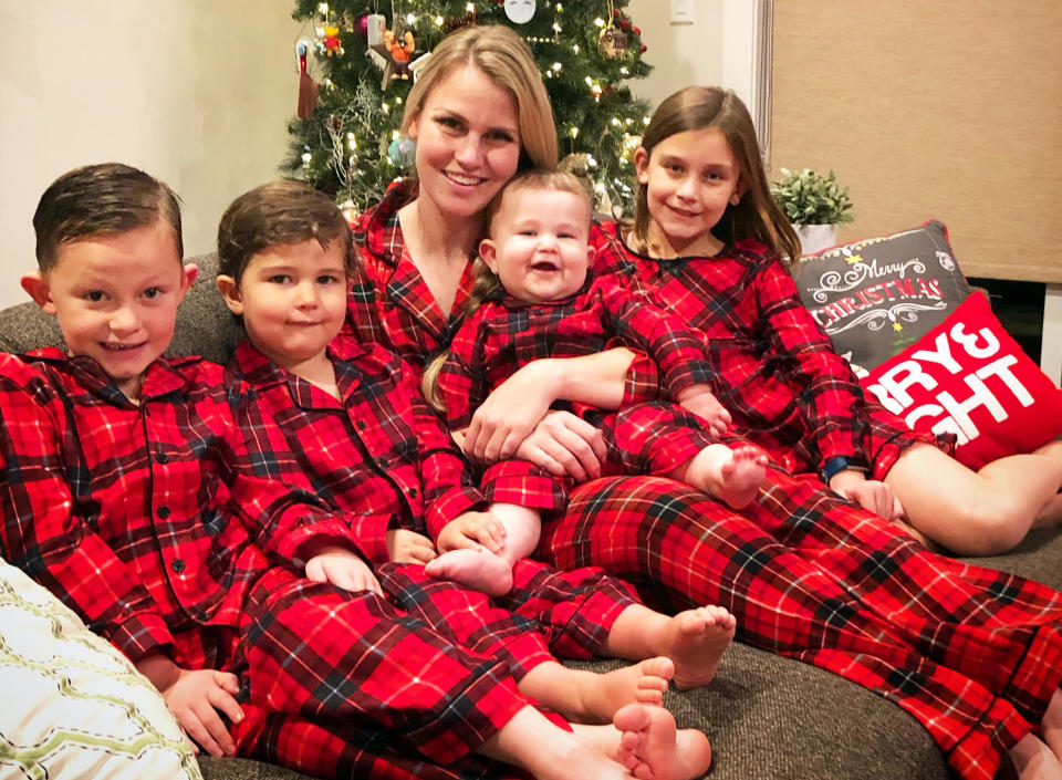 In this December 2018 photo, Jocelyn Smith poses with her four children, from left, Tucker, 6, George, 3, Mason, 11 months old, and Lucy, 9, in Camas, Wash. Smith says she hasn't gone out in public with Mason for 10 days because he's still too little to be vaccinated against the measles and she's afraid he will be exposed to the virus. A measles outbreak near Portland has sickened dozens of people in Oregon and Washington, with several more cases suspected, and public health officials scrambling to contain the virus say low vaccination rates are making the situation worse. Public health officials scrambling to contain a measles outbreak in the Pacific Northwest warned people to vaccinate their children Monday, Jan. 28, 2019. (AP Photo via Jocelyn Smith)