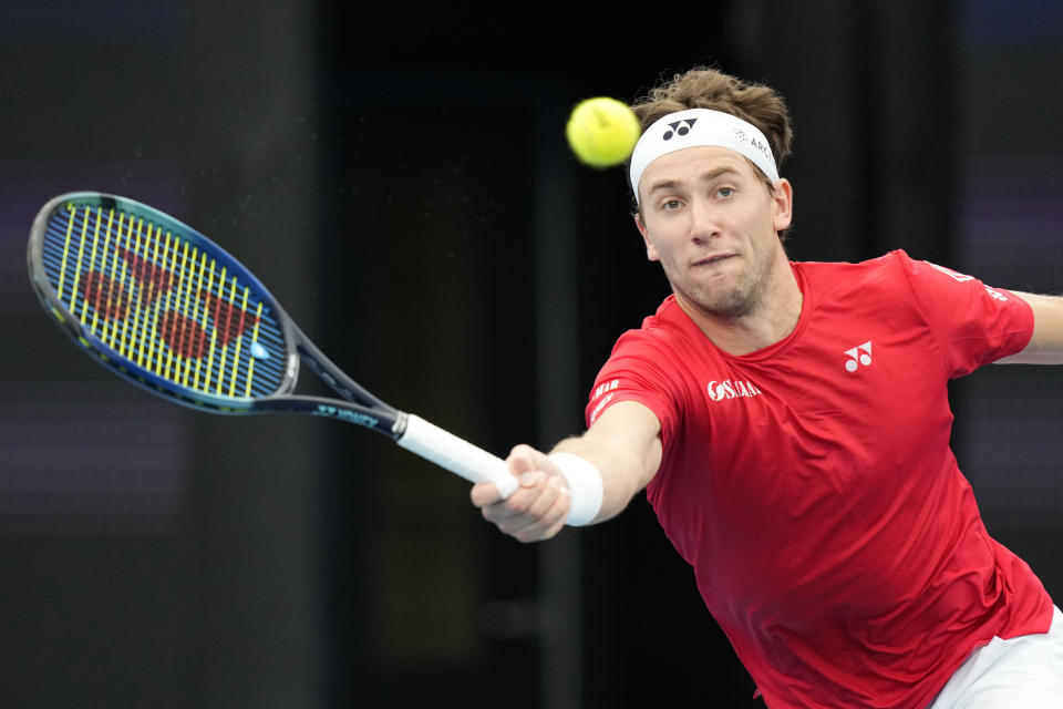 Casper Ruud of Norway plays a forehand to Tallon Griekspoor of Netherlands during the United Cup tennis tournament in Sydney, Saturday, Dec. 30, 2023. (AP Photo/Rick Rycroft)