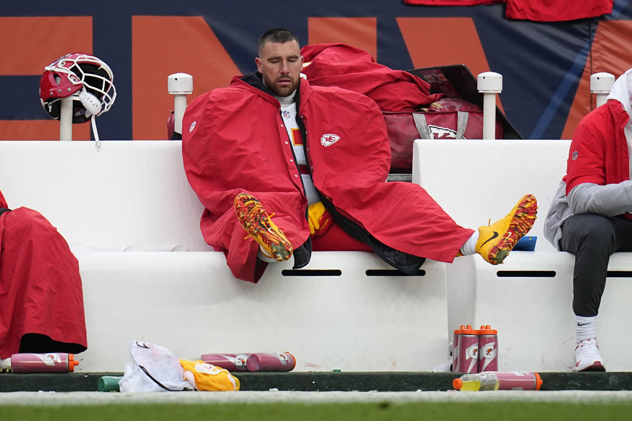 Kansas City Chiefs tight end Travis Kelce sits on the bench during the second half of an NFL football game against the Denver Broncos Sunday, Oct. 29, 2023, in Denver. (AP Photo/Jack Dempsey)