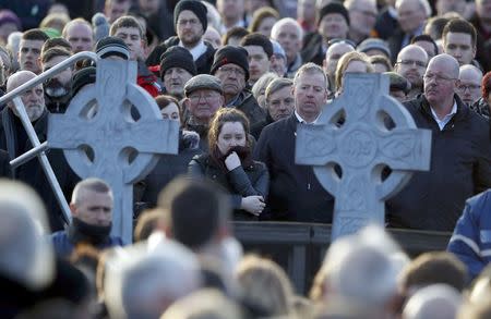 Mourners gather for the funeral of Martin McGuinness in Londonderry, Northern Ireland, March 23, 2017. REUTERS/Phil Noble