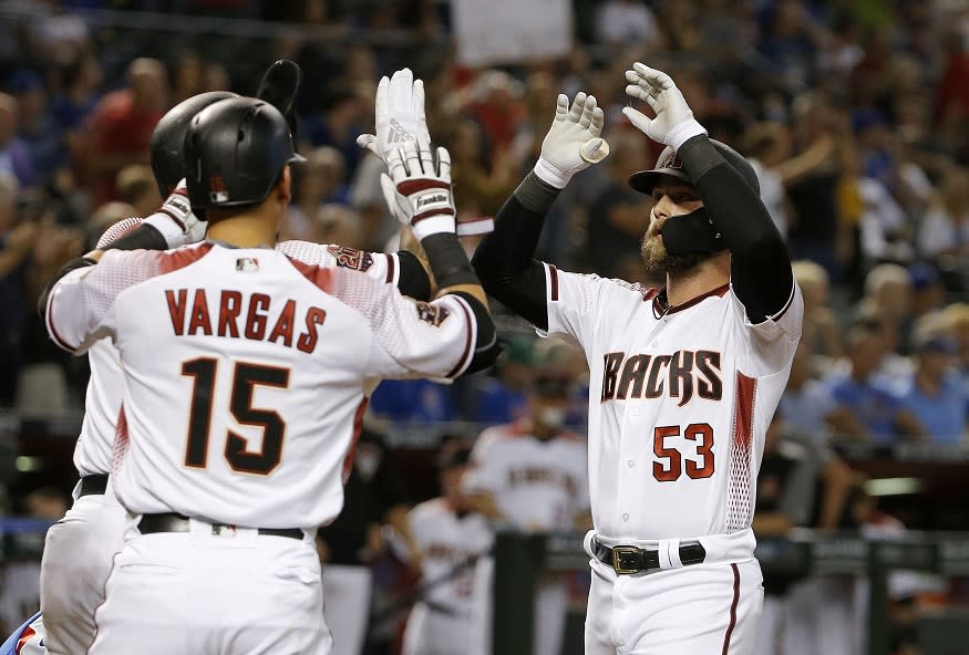 Diamondbacks first baseman Christian Walker (53) celebrates his three-run home run against the Cubs. (AP)