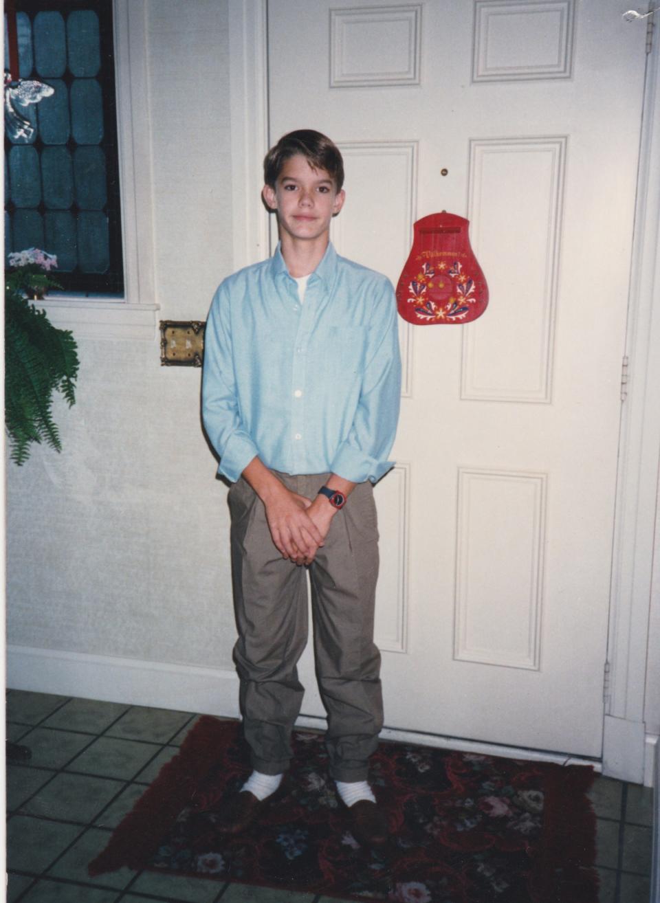 A photo provided by Nate Lindstrom shows him at age 14 on the first day of his freshman year of high school.