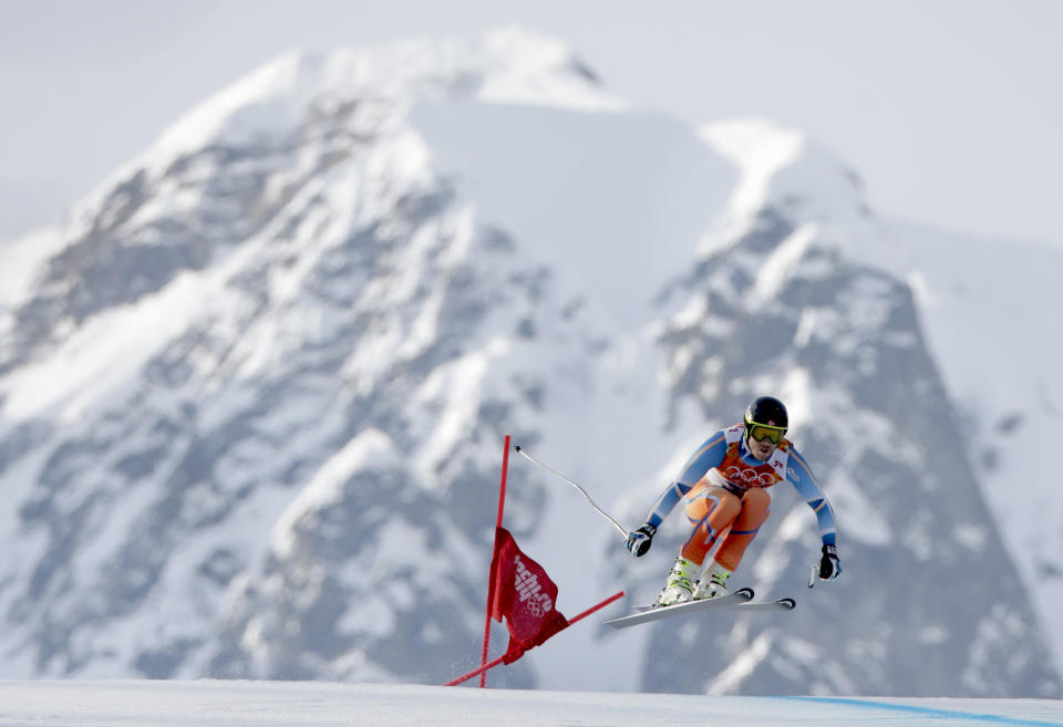 Norway's Kjetil Jansrud makes a jump in the men's super-G at the Sochi 2014 Winter Olympics, Sunday, Feb. 16, 2014, in Krasnaya Polyana, Russia. (AP Photo/Charlie Riedel)