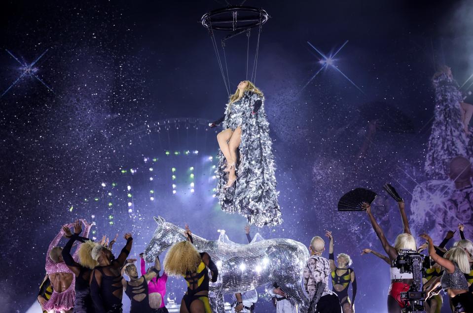 Beyoncé being lowered onto a crystal horse for the finale of the Renaissance World Tour.