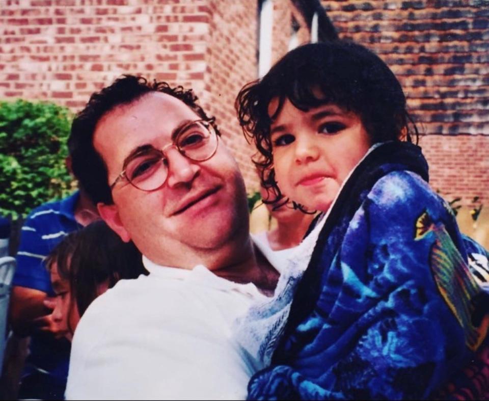 Katie Pereira, seen here as a child, lost her father (at left) in the World Trade Center attacks and now works as a regional manager at the bereavement camp to help others.