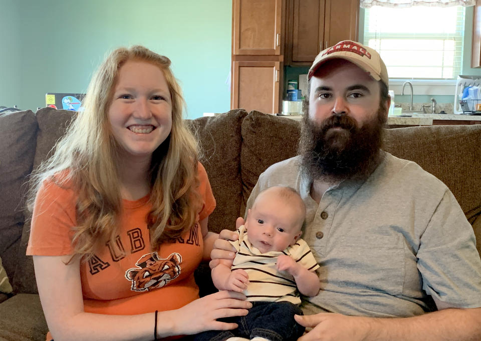 Mariel and Josh Prince with their son, Declan. Josh's father personally delivers roses whenever there is a new baby in the family, a tradition started by his father; because of social distancing, he could not do that to welcome Declan, and had to order some from a local florist instead. (Courtesy Mariel Prince)