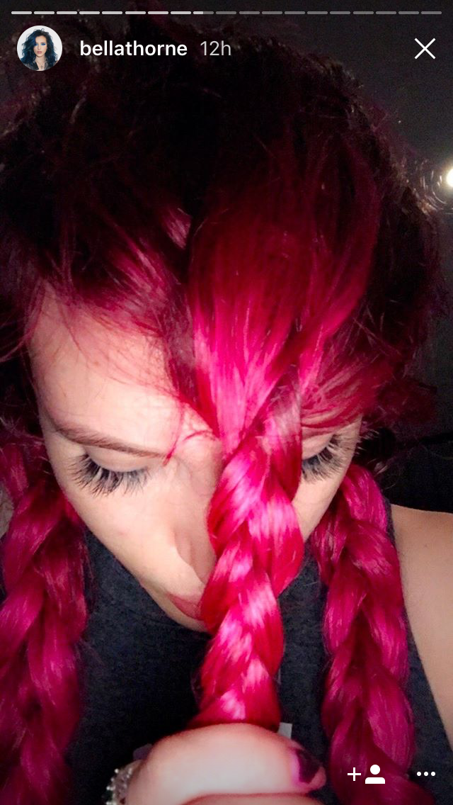 Image of Bella Thorne with pink hair