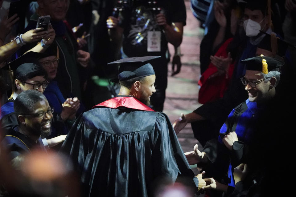 Golden State Warriors Stephen Curry arrives for his graduation ceremony at Davidson College on Wednesday, Aug. 31, 2022, in Davidson, N.C. Curry was also inducted into the school's Hall of Fame and his number and jersey were retired during the event. (AP Photo/Chris Carlson)