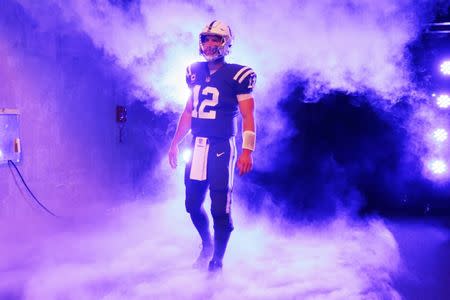 Nov 25, 2018; Indianapolis, IN, USA; Indianapolis Colts quarterback Andrew Luck (12) is introduced before the game against the Miami Dolphins at Lucas Oil Stadium. Mandatory Credit: Brian Spurlock-USA TODAY Sports