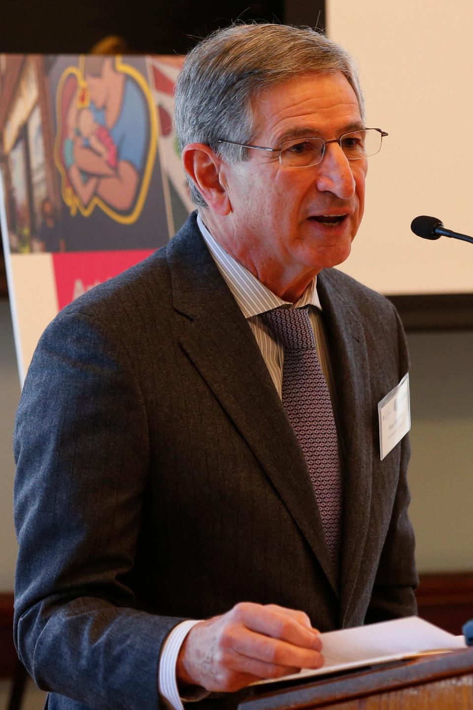 Tony Sapienza, President of the New Bedford Economic Development Council, speaks at a ceremony held at the downtown New Bedford Public Library where New Bedford Creative announced the release of eighty-two grant awards totaling $509,200.