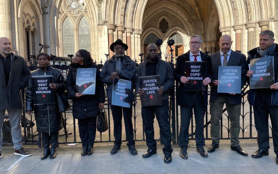 Supporters and relatives of Basil Peterkin and Saliah Mehmet outside the Royal Court of Justice in London