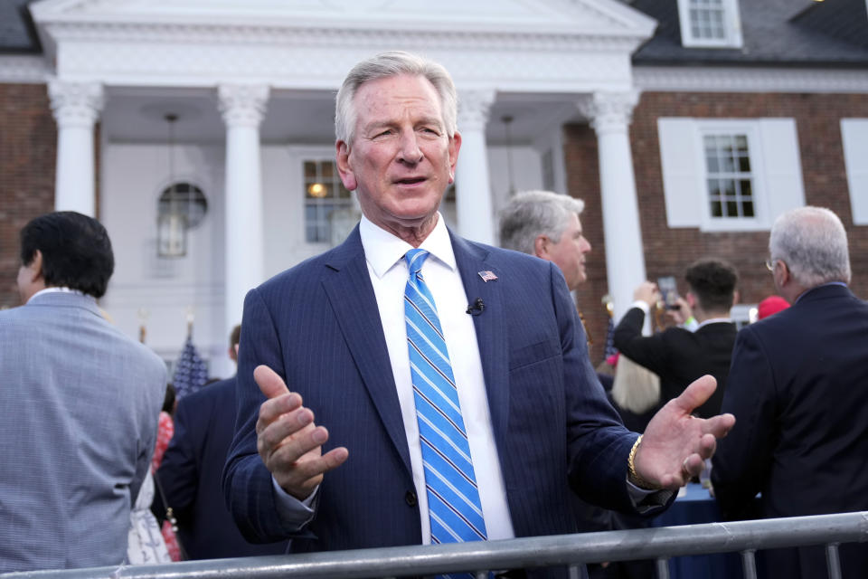 Sen. Tommy Tuberville gives a television interview at Trump National Golf Club in Bedminster, N.J.