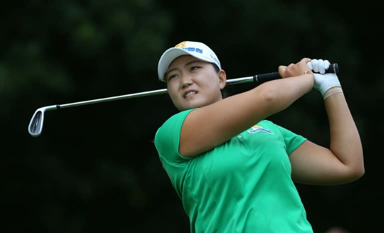 South Korea's Lee Mirim tees off on the first day of the 2016 Women's British Open Golf Championships at Woburn Golf Club in central England, on July 28, 2016