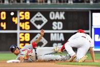 Jun 19, 2018; Philadelphia, PA, USA; St. Louis Cardinals shortstop Yairo Munoz (34) is caught stealing as he's tagged out by Philadelphia Phillies second baseman Scott Kingery (4) during the fourth inning at Citizens Bank Park. Mandatory Credit: Eric Hartline-USA TODAY Sports