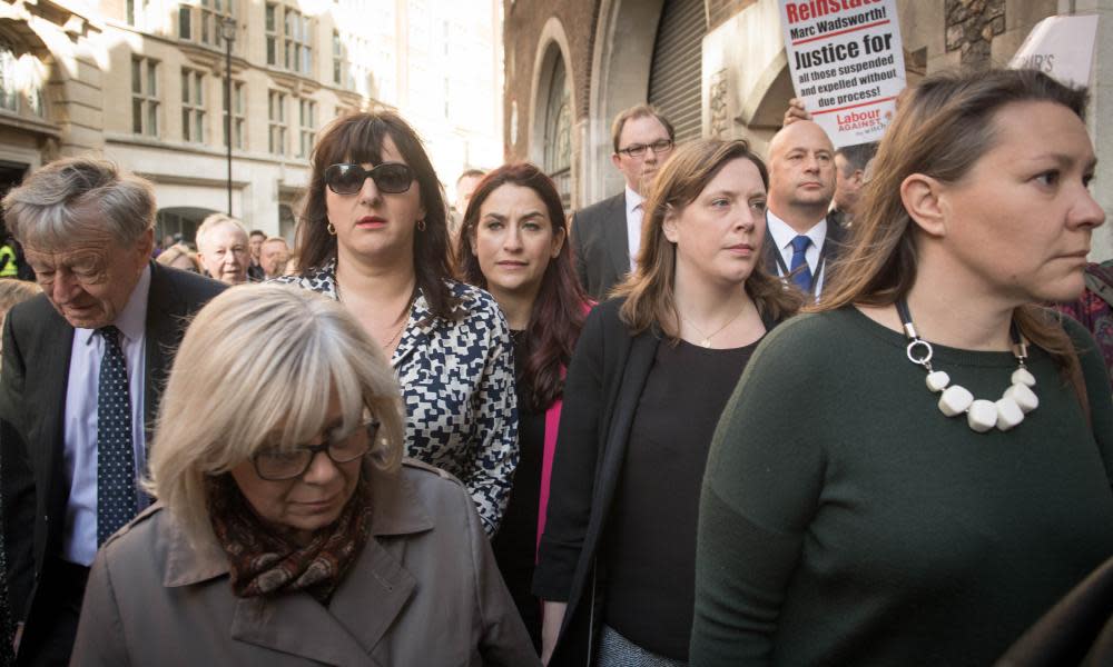 About 40 MPs marched with their colleague Ruth Smeeth to a party disciplinary hearing.