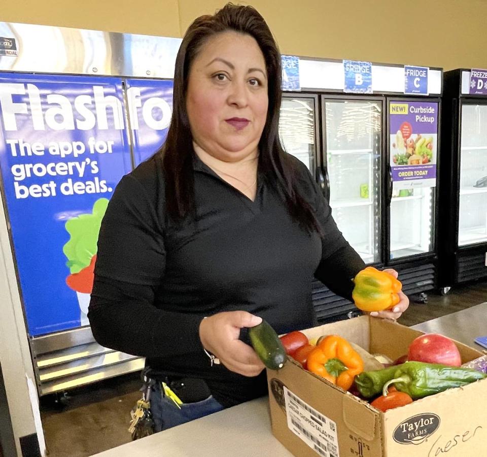 Aide Garcia, manager of the Lucky store in Fremont CA, displays some of the soon-to-expire food to be discounted with an app launching March 20, 2024. Lucky is part of the Save Mart Cos., based in Modesto.