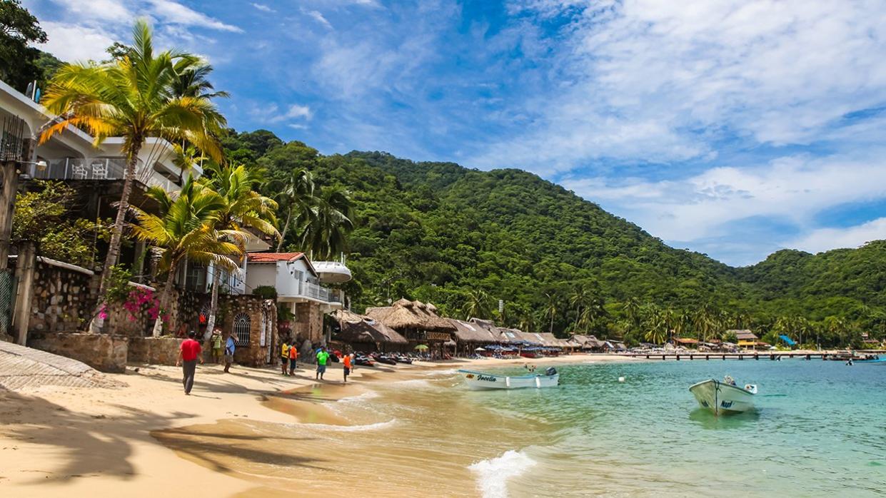 A beach in Puerto Vallarta. Experts say travel to Mexico is still say if you stay away from the no-travel areas.