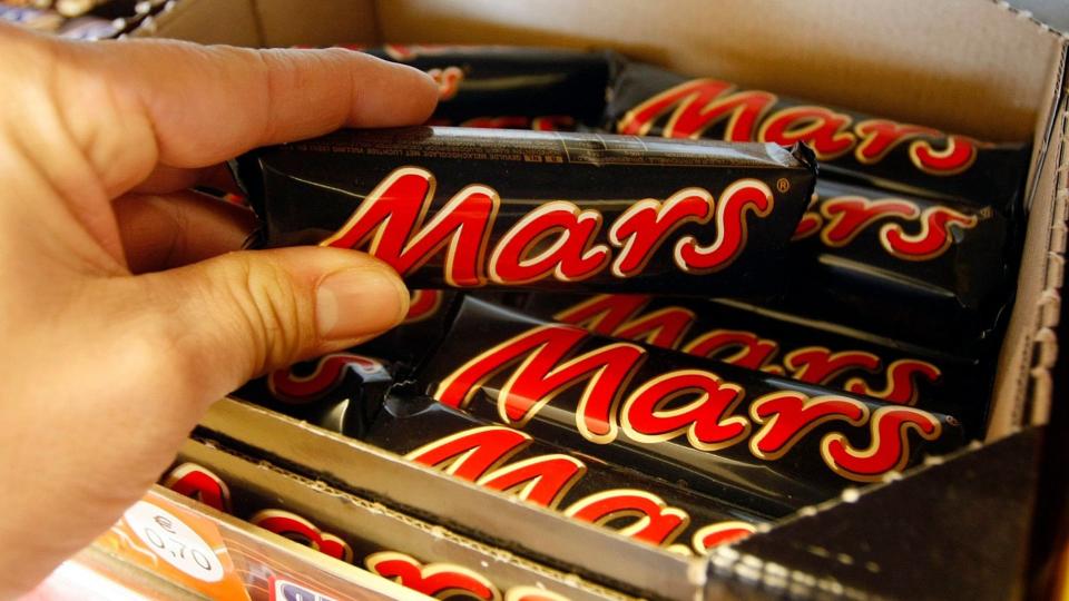 Mandatory Credit: Photo by Martin Meissner/AP/Shutterstock (7071798a)Chocolate bars from Mars are pictured in a store in Gelsenkirchen, Germany.