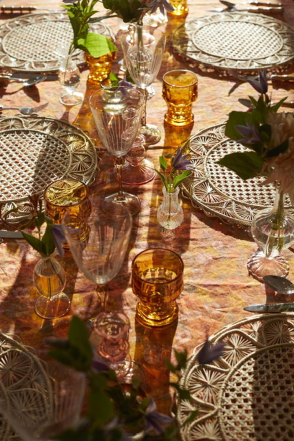 An orange tablescape with glassware