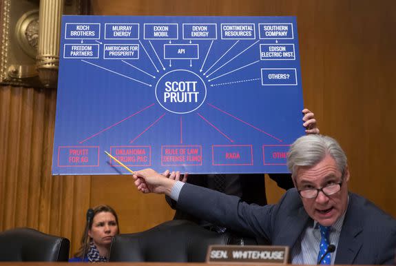 Sen. Sheldon Whitehouse, D-Rhode Island, points to a chart as he questions EPA nominee, Oklahoma Attorney General Scott Pruitt, in Washington on Jan. 18, 2017.