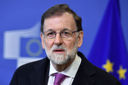 Spanish Prime Minister Mariano Rajoy talks to the media at the start of an International High-Level Conference on Sahel in Brussels, Belgium February 23, 2018. REUTERS/Eric Vidal