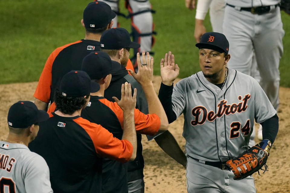 Detroit Tigers' Miguel Cabrera (24) celebrates with teammates after their baseball game against the Kansas City Royals Friday, May 21, 2021, in Kansas City, Mo. The Tigers won 7-5. (AP Photo/Charlie Riedel)