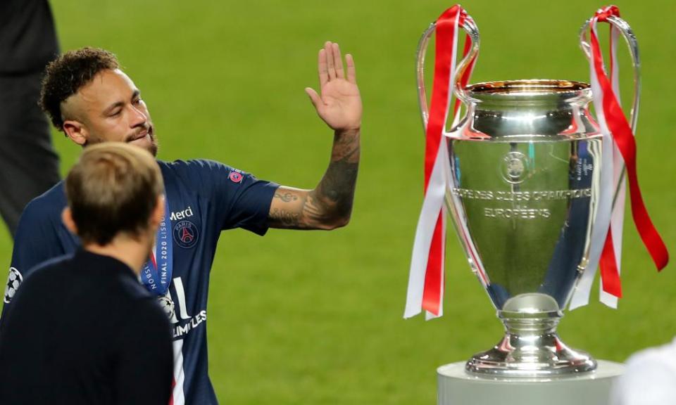 Neymar waves at the Champions League trophy after losing the 2020 final