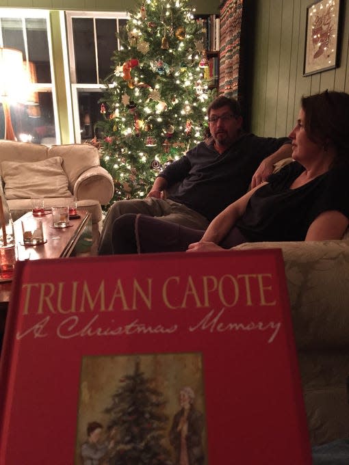 A reading  in 2015,  with Tom and Kris Burns on the couch.