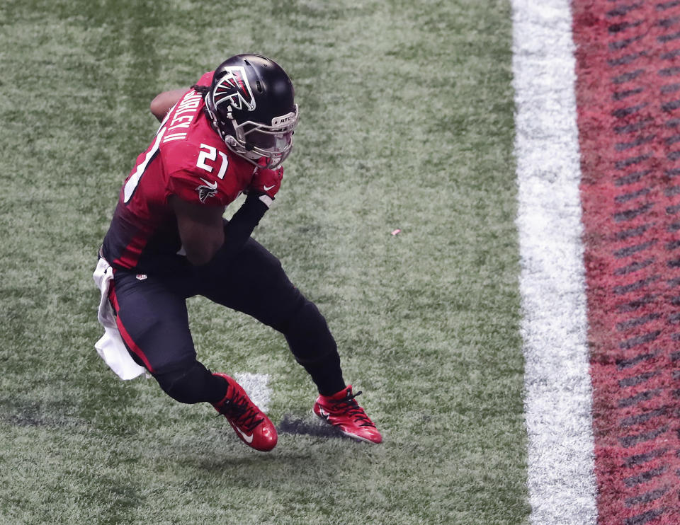 Atlanta Falcons' Todd Gurley tries to stop short of the end zone during the fourth quarter of an NFL football game against the Detroit Lions, Sunday, Oct. 25, 2020, in Atlanta. Gurley landed on the goal line for a touchdown that, as it turned out, led to another stunning loss for the Atlanta Falcons. (Curtis Compton/Atlanta Journal-Constitution via AP)