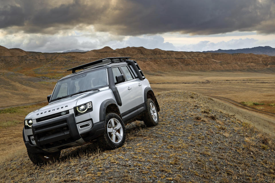 This photo provided by Jaguar Land Rover Ltd. shows the 2021 Land Rover Defender. The Defender combines luxury and off-road capability in the same sleek package, with lots of options for owners that want to go far off the beaten path. (Nick Dimbleby/Jaguar Land Rover Ltd. via AP)